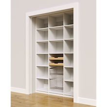 Open pantry storage in white with 54 inch width, two wood pull-out drawers, and two pull-out wire baskets.