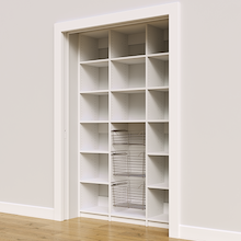 Open pantry storage in white with 54 inch width and three sliding wire baskets.