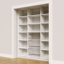 Three wire pull-out baskets in a 66 inch white kitchen pantry.