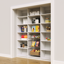 Large 72 inch white pantry shelving with three wire pull-out baskets.