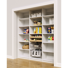 White 75 inch pantry shelving with two wood pull-out drawers and two pull-out wire baskets for cereal and cans.
