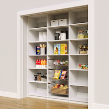 White 75 inch pantry rack with three wire baskets for easy access.