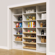 81 inch vertical pantry shelves in white with four wood pull-out drawers.