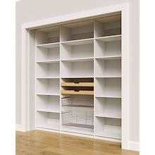 Wide profile view of 84 inch white pantry shelving with wood drawers and pull-out wire baskets.