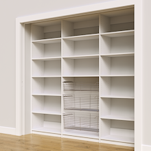 Large white 90 inch pantry storage for cans and dry goods.