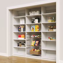 White 90 inch reach in kitchen pantry shelving featuring three sliding wire baskets.