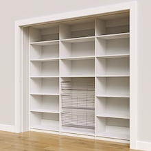 Side profile of white 93 inch pantry storage with three wire baskets.