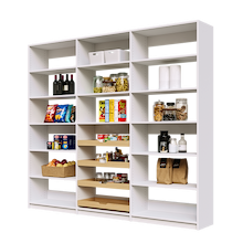 Full wall 96 inch white pantry shelving with four wood pull-out drawers.