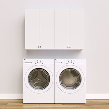 White Basic Laundry Kit with storage doors and overhead shelving installed above a washer and dryer providing built-in laundry room storage. Yes