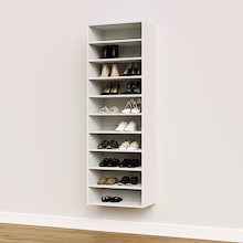 White shoe organizer with 10 straight shelves for upright footwear storage in a bedroom closet.