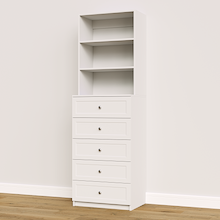 White shaker built-in closet drawers for custom wardrobe and closet systems.