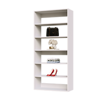 White 31.5 inch shelf tower for storage in a large walk-in closet.