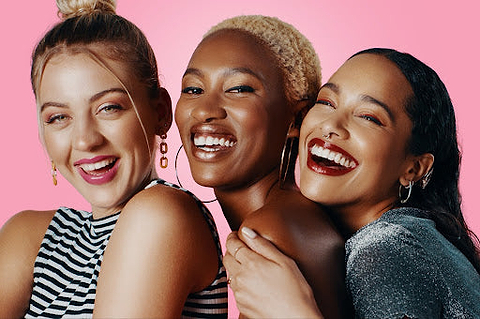 3 women laughing and loving life.