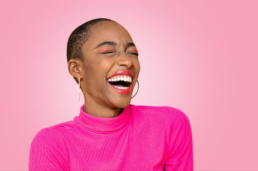 Women laughing and feeling good after a course of apple cider vinegar.