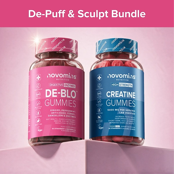 Two supplement bottles from novomins wellness displayed on pink blocks against a pink background. The left bottle is pink and labeled 'DE-BLO GUMMIES' digestive enzyme, and the right bottle is blue and labeled 'CREATINE GUMMIES'.