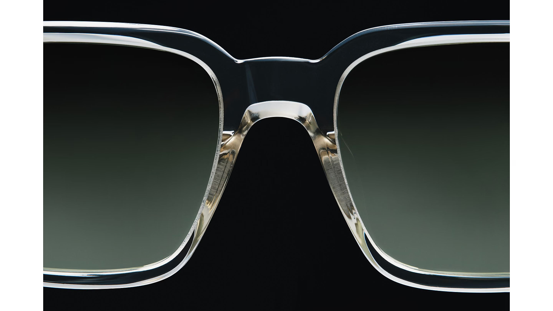 These sunglasses appear to be the Paul Smith Austin model, featuring a distinctive square frame with a transparent, laminated acetate finish.