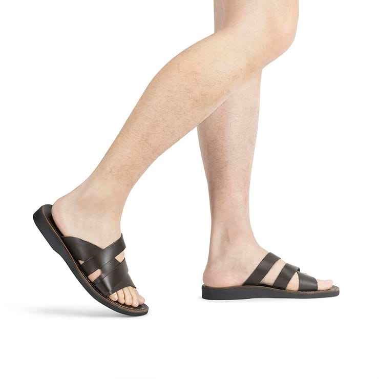 Model wearing Lucas brown, handmade leather slide sandals