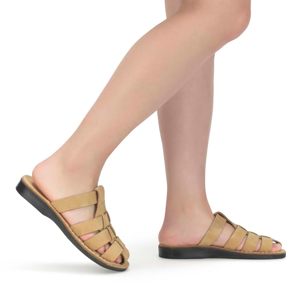 Model wearing Michael Slide yellow nubuck leather pacific slide sandal - side view