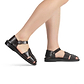 Model wearing Gemma brown, handmade leather sandals fisherman sandal silhouette