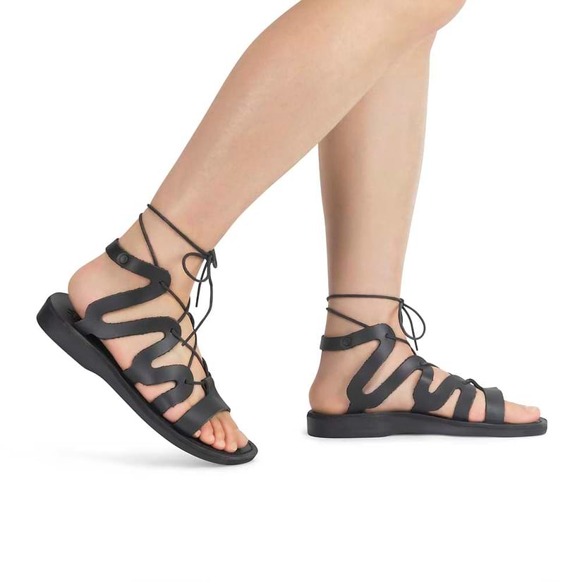 Model wearing Emma black, handmade leather sandals with back strap and toe loop