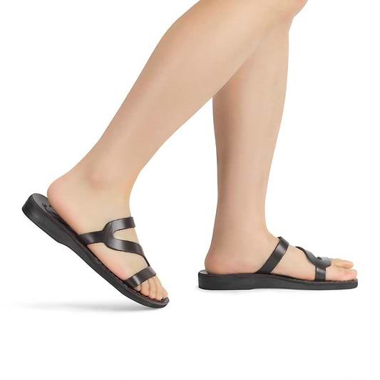 Model wearing Natalie brown, handmade leather slide sandals with open toe