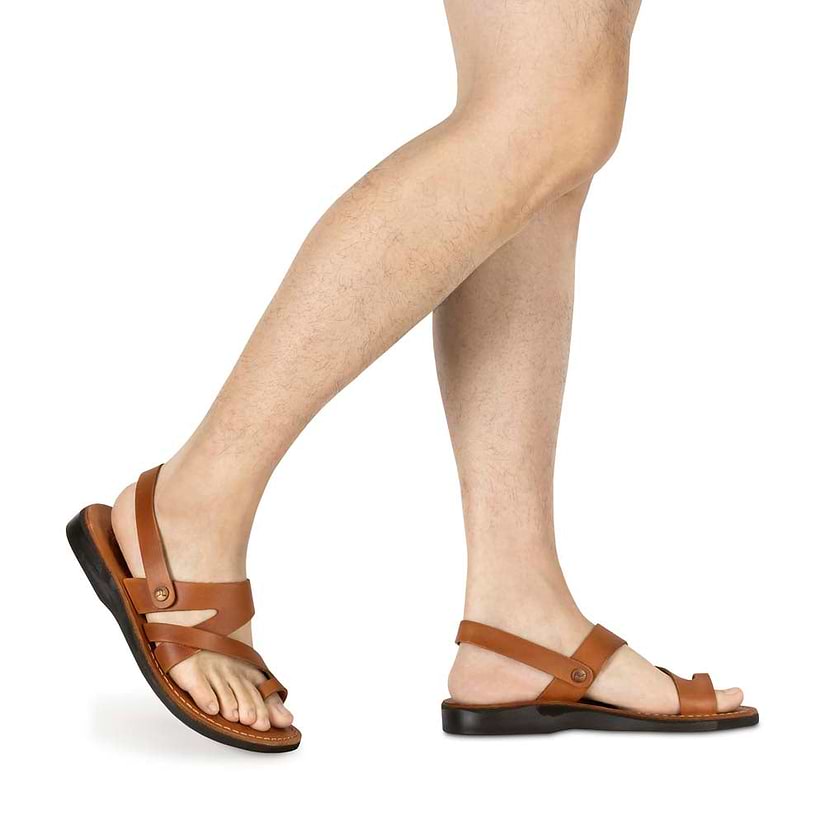 Model wearing Benjamin honey, handmade leather sandals with back strap and toe loop