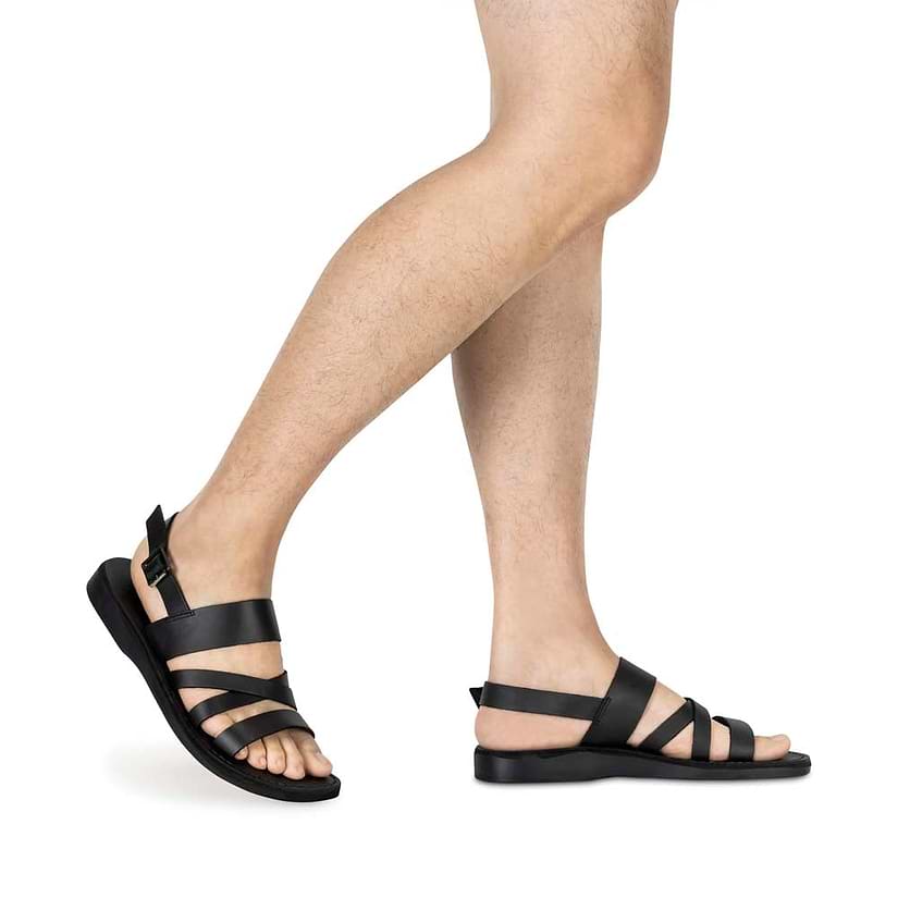 Model wearing Silas black, handmade leather sandals with back strap