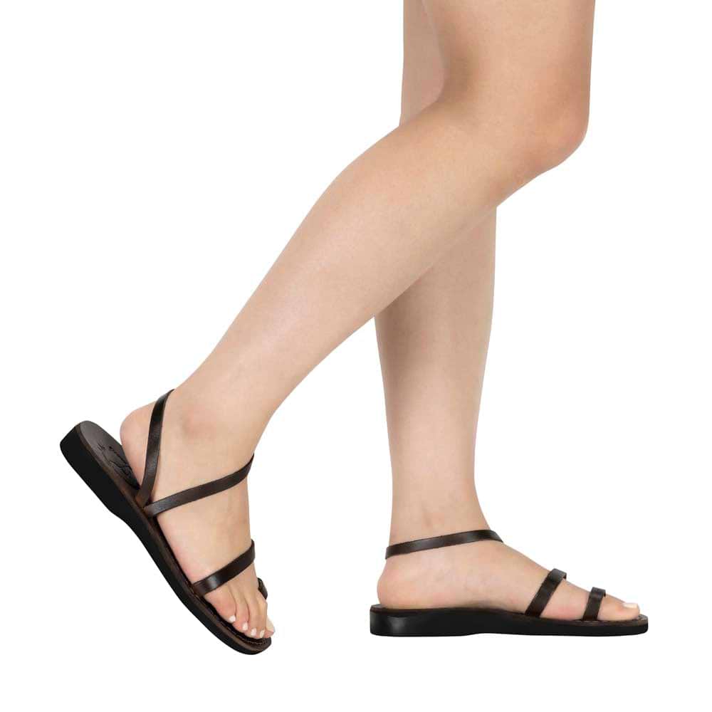 Model wearing Ella brown, handmade leather sandals with back strap and toe loop