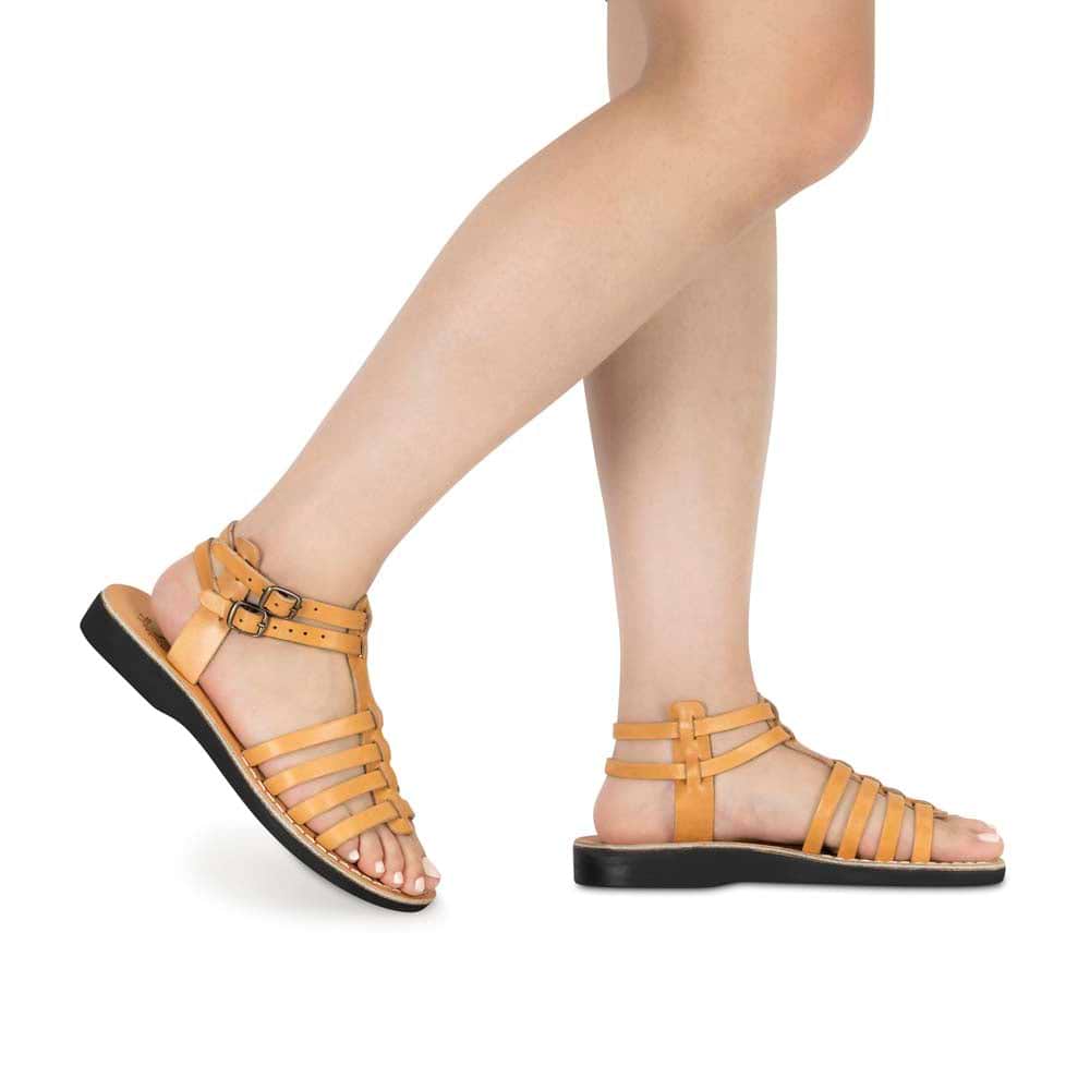 Model wearing Leah tan, handmade leather sandals with back strap