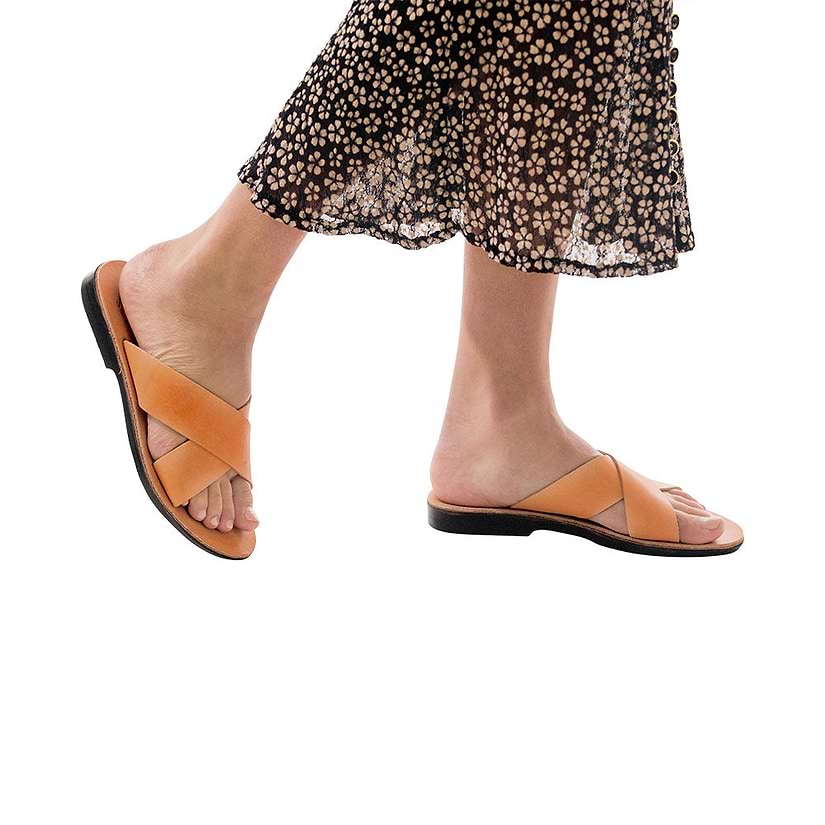 Model wearing Isla tan, handmade leather slide sandals