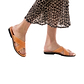 Model wearing Isla tan, handmade leather slide sandals