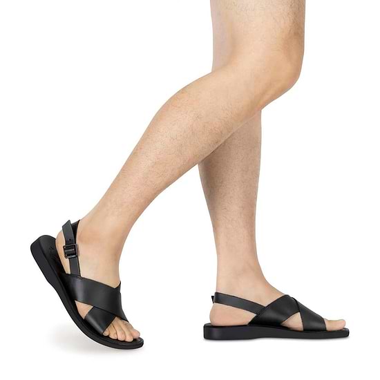 Model wearing Elan Buckle black, handmade leather sandals with back strap - Front View