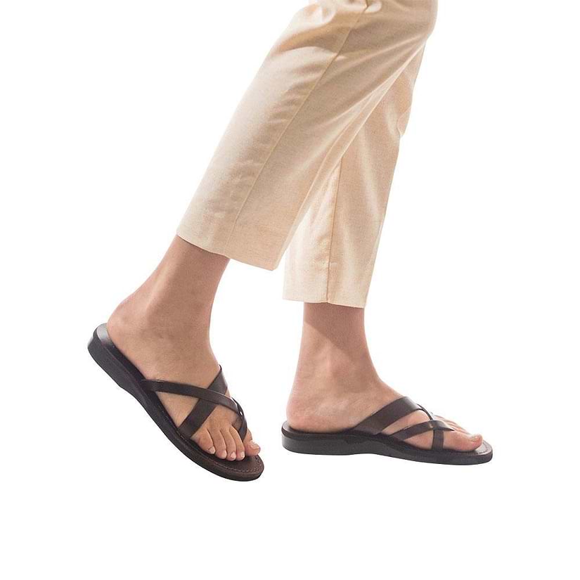 Model wearing Abigail brown, handmade leather slide sandals with toe loop