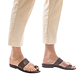 Model wearing Abra brown, handmade leather slide sandals with toe loop 