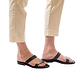 Model wearing Ada black, handmade leather slide sandals 