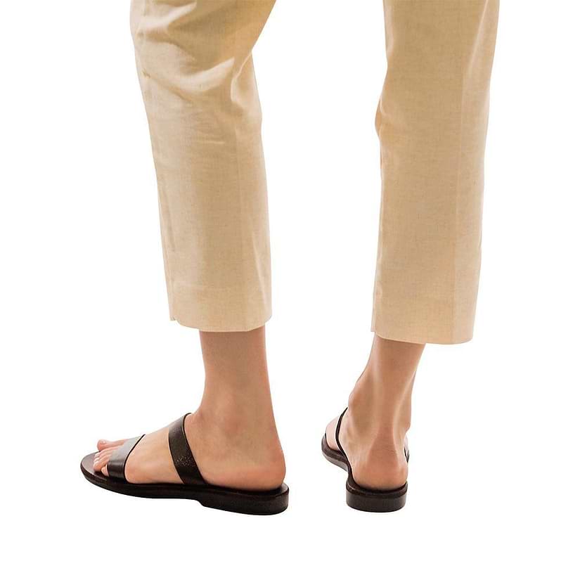 Model wearing Ada brown, handmade leather slide sandals 