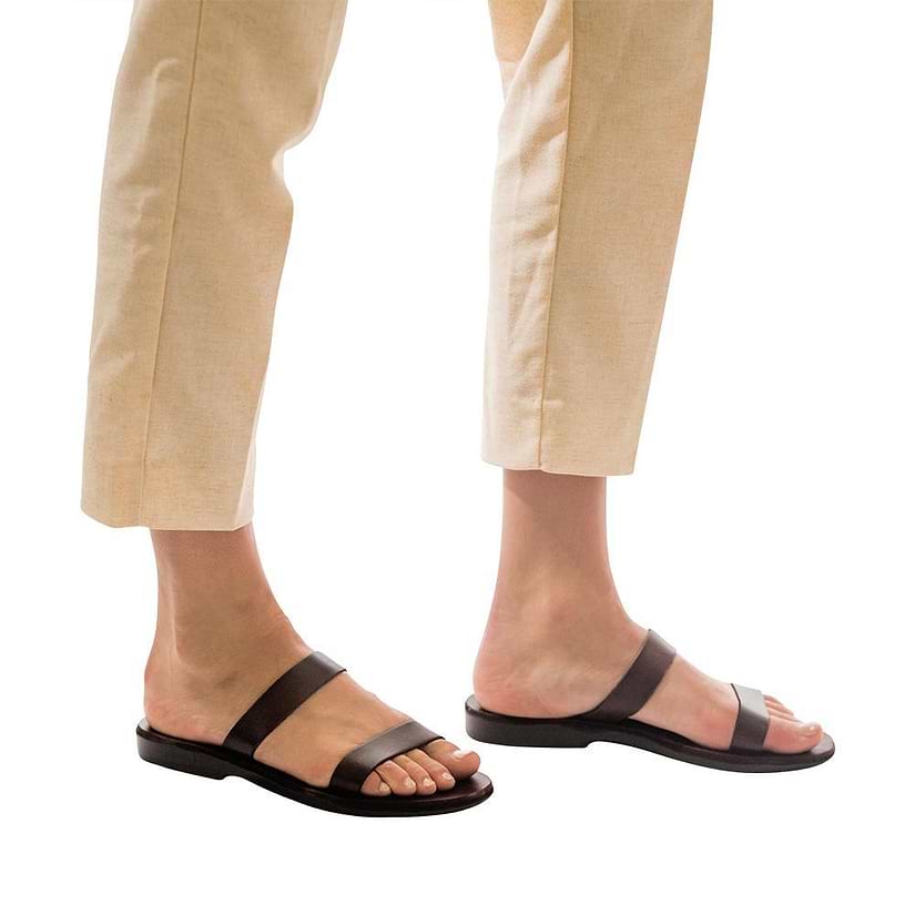 Model wearing Ada brown, handmade leather slide sandals 