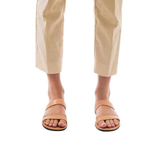 Model wearing Ada tan, handmade leather slide sandals 