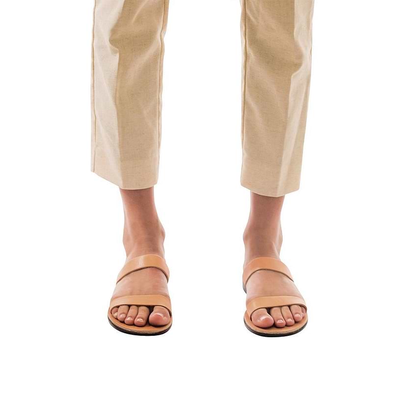 Model wearing Ada tan, handmade leather slide sandals 