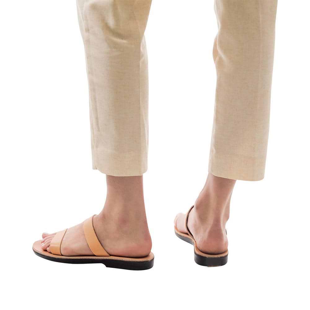 Model wearing Ada tan, handmade leather slide sandals 