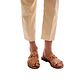 Model wearing Aja tan, handmade leather slide sandals with toe loop 