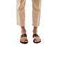 Model wearing Angela black, handmade leather slide sandals with toe loop 