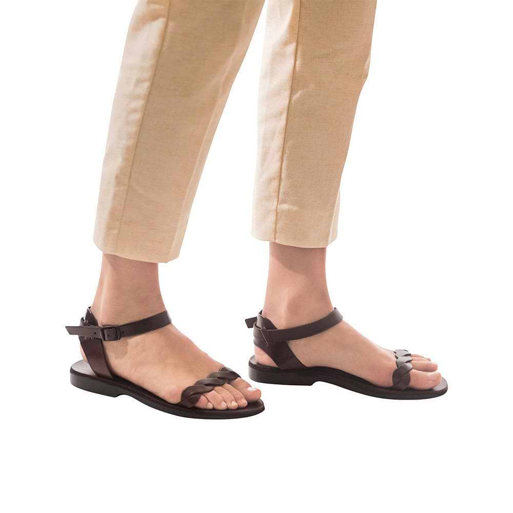 Model wearing Arden brown, handmade leather sandals with back strap  