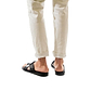 Model wearing Asher black, handmade leather slide sandals with toe loop 