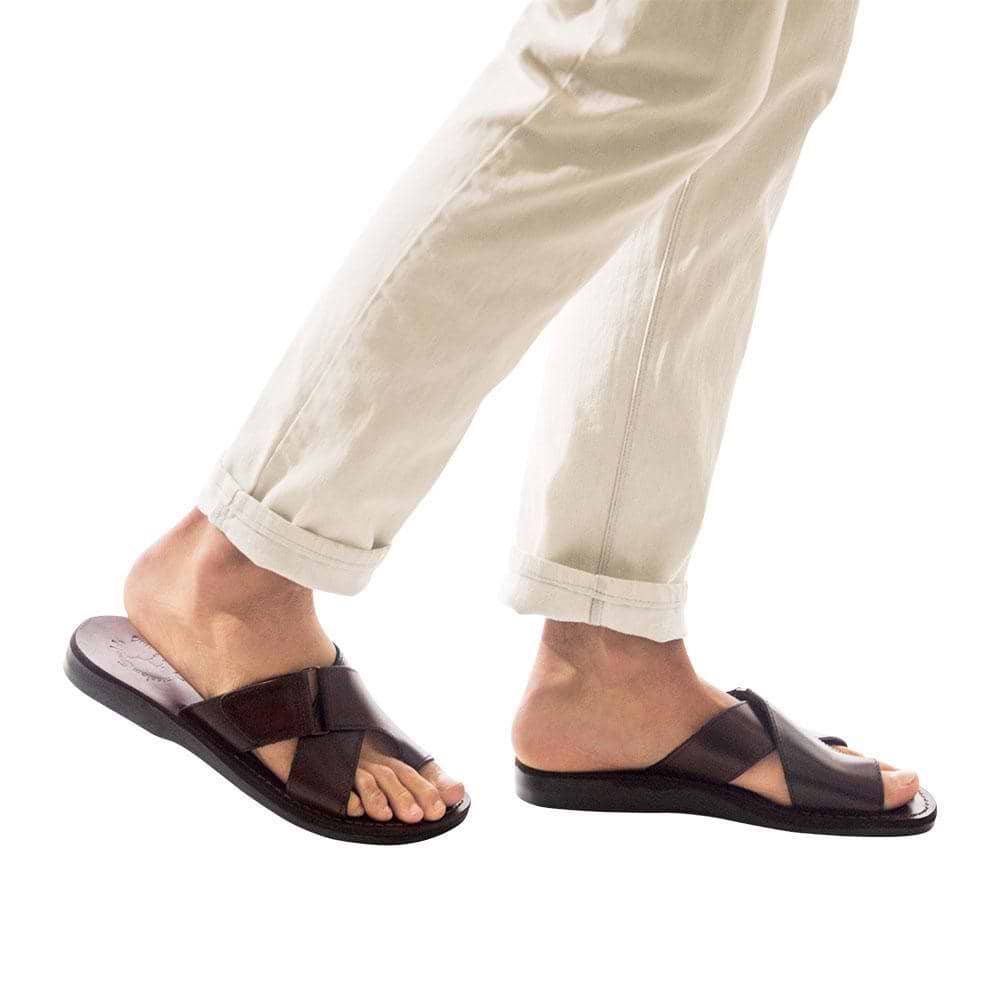 Model wearing Asher brown, handmade leather slide sandals with toe loop 
