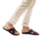 Model wearing Asher brown, handmade leather slide sandals with toe loop 