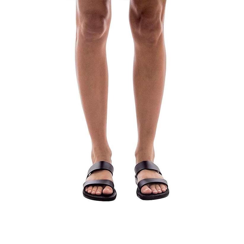 Model wearing Aviv black, handmade leather slide sandals 