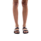 Model wearing Aviv black, handmade leather slide sandals 