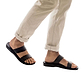 Model wearing Aviv black, handmade leather slide sandals 