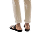 Model wearing Aviv black, handmade leather slide sandals 